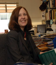 Mary Pickering in her office surrounded by books. 