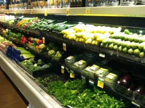 A picture of produce including squash, cucumbers and artichokes at the Safeway Market grocery store