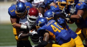 SJSU defense crushes New Mexico ball carrier.