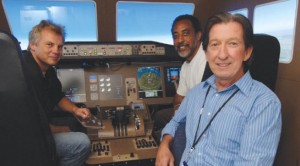 Kevin Jordan and colleagues in flight simulator