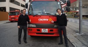 two students with Crown truck in Hong Kong