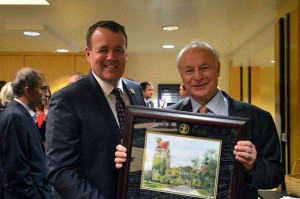 Provost Andy Feinstein, left, presented Dean David Steele with a plaque commemorating his service to San Jose State at a farewell reception Nov. 13.