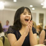 Linh Nguyen, an SJSU student, reacts to the announcement of a Spartan Daily Award at the California College Media Association's Award Banquet.