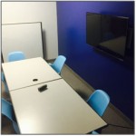 New furniture and video screens are installed in library study rooms.