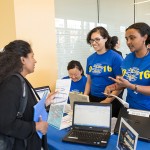 Students check in guests at the SJSU Cultural Showcase April 21.