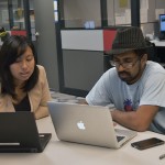 College student success centers provide general education advisement and other resources for students. Here, Career Center Advisor Lynn Chang discusses potential career paths with Raghev Srivastava, ’15 Philosophy.