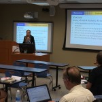 Jennifer Redd presents some statistics to faculty on use of technology in classrooms.