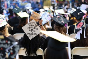 Students don decorated caps at San Jose State University's 2016 Commencement.