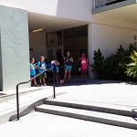 Silicon Valley YMCA Day Camp students learn where they can become a teacher as part of a scavenger hunt of SJSU's campus. Here, they stand outside Sweeney Hall, home of the Connie L. Lurie College of Education.