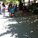 Silicon Valley YMCA students look at a printed SJSU map outside of Clark Hall on June 24 as they conducted a scavenger hunt on the campus.