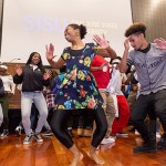 Photo: David Schmitz SJSU volunteers energize the crowd with dancing.