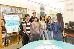 Photo: David Schmitz Students visit Peer Connections location in the Student Services Center during an open house event in September. The program offers mentors and tutors.