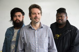 Left to right, Devin Cunningham, Dr. Aaron Romanowsky and Christopher Dixon pose for a photograph at San Jose State University, on Thursday, Feb. 2, 2017. Dr. Romanowsky is currently working with undergraduates on a research project. (Photo: James Tensuan, '15 Journalism)