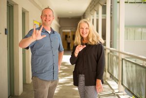 Peg Hughes and Everett Smith pose for a photograph at Sweeney Hall at San Jose State University on Wednesday, Sept. 27, 2017. (James Tensuan/San Jose State University)