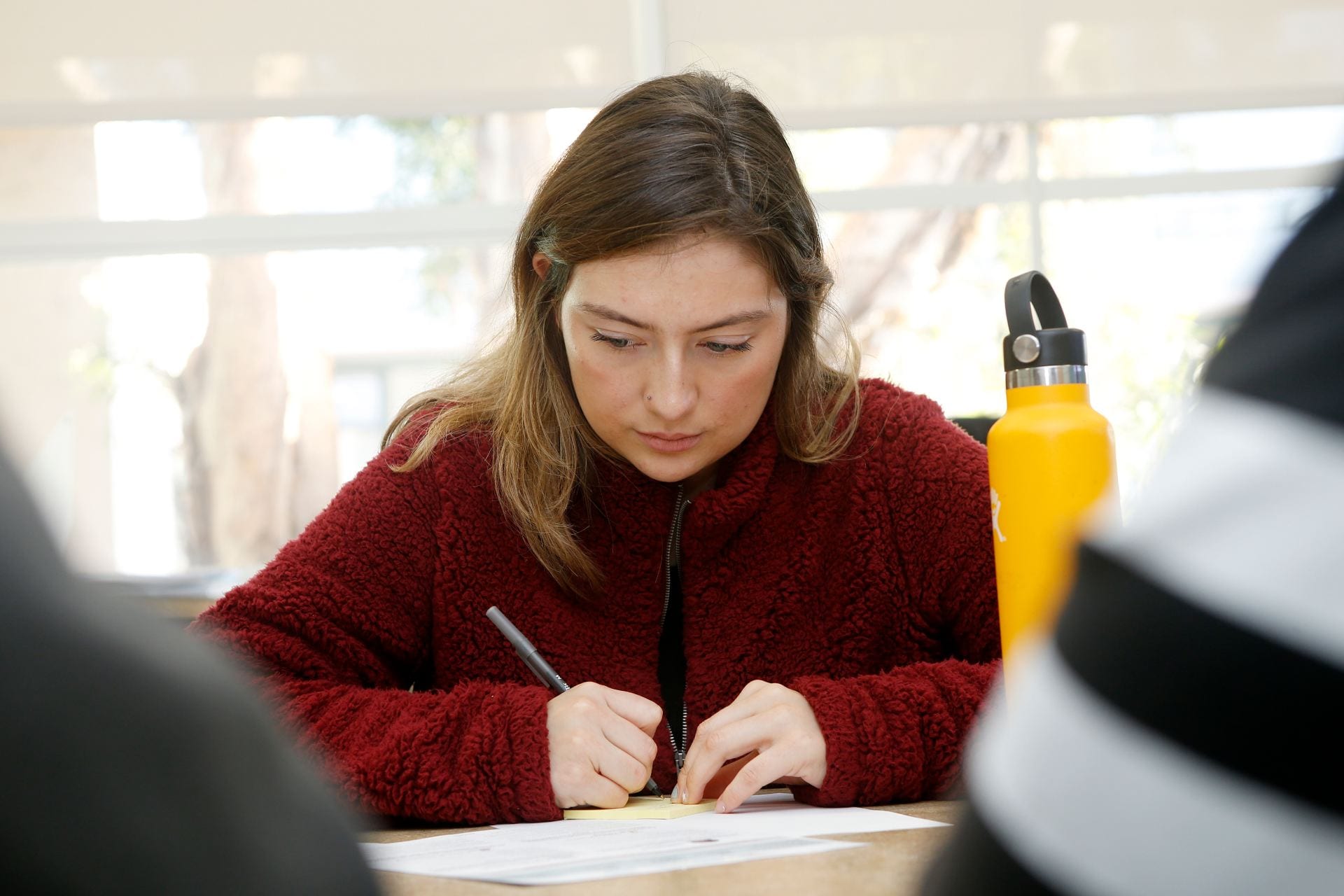 Lyzett Levenant, a senior biology major, participated in a focus group with Education Design Lab to help SJSU select two digital badges to pilot in the spring. ( Josie Lepe/San Jose State University )
