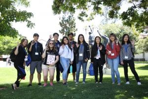 Incoming students pose for a photo with their orientation leader at San Jose State University on Thursday, June 28, 2018. (Photo: Jim Gensheimer)