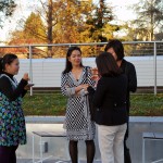 Health Science Professor Jane Pham, second from the left, and Social Work Professor Meekyung Han, second from the right, talk with visitors from Vietnam during the Social Work Education Enhancement Program Fellows' reception March 4 on the Yoshihiro Uchida Hall rooftop terrace.