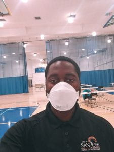 Darius Brown wears a face mask on the COVID-19 frontlines