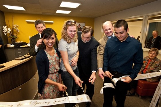President Kassing, Provost Selter and students cut the ribbon at the CASA Student Success Center grand opening Feb. 2.