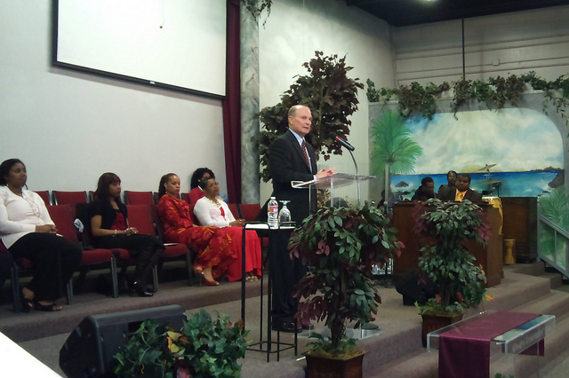 Interim President Don Kassing speaking to the congregation at Maranatha Christian Center.