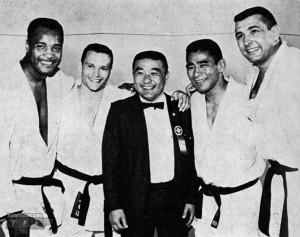 Yoshihiro Uchida at the 1964 Tokyo Olympics with George Lee Harris, Jim Bregman, Paul Maruyama and Ben Nighthorse Campbell, who went on to become a U.S. senator (courtesy of Bruno Carmeni's Judo Blog).