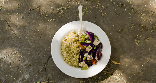 Teriyaki Tofu Salad and Quinoa in a white-rimmed bowl.