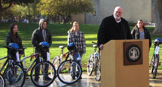 Assemblymember Jim Beall with bike recipients.