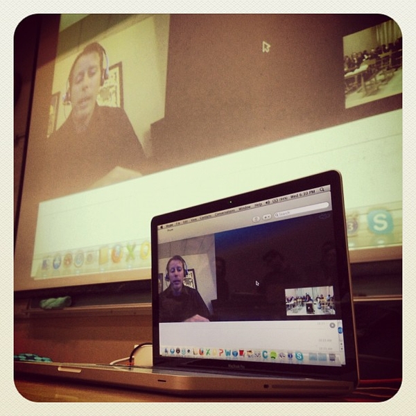 A computer is connected to a projector displaying a Skype conversation with CEO of Fancorp, a brand advocacy company. The guest speaker was for Michael Brito's Developing Strategies for Socia Media Class.