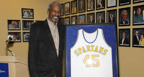 Spartan Darnell Hillman stands with his white basketball jersey with the number 45