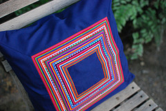 "Lisu Voice" pillow, deep blue with multicolored embroidery