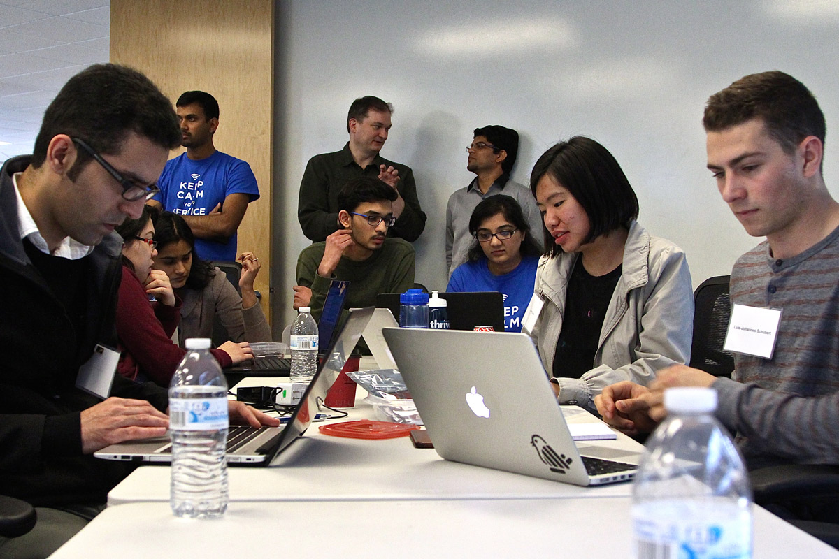 San Jose State undergraduate and graduate computer science majors whip out their laptops and begin downloading Python and JavaScript software (Photo: Lauren Hernandez, ’15 Journalism).