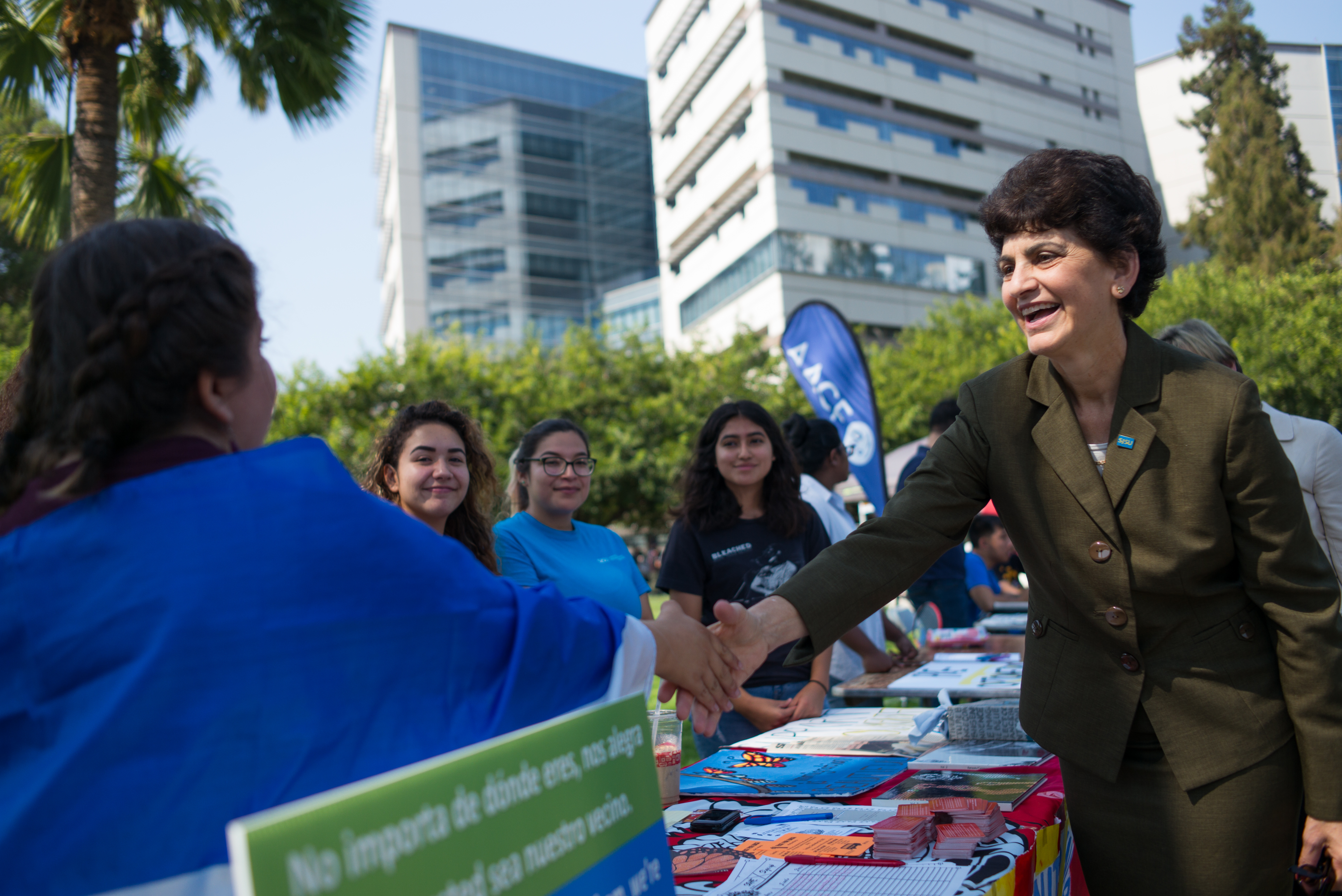 President Mary Papazian meets with Student Advocates for Higher Education as she visited clubs tabling outside Tower Hall on Tuesday, Sept. 5, 2017. (James Tensuan/San Jose State University)