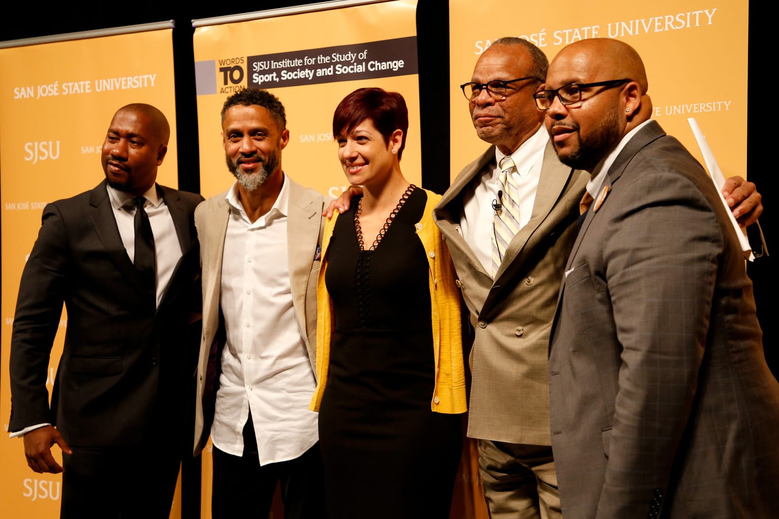 Bridging the Gap: Perspectives on Athlete Activism in an Era of Growth Panelists Damion Thomas, Mahmoud Abdul-Rauf, Toni Smith-Thompson, and C. Keith Harrison (right) pose with Moderator Bill Rhoden, (second from the right.)