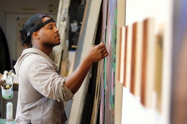 Titus Kaphar displays some of his work in his New Haven, Connecticut studio.(Photo by John D. and Catherine T. MacArthur Foundation)
