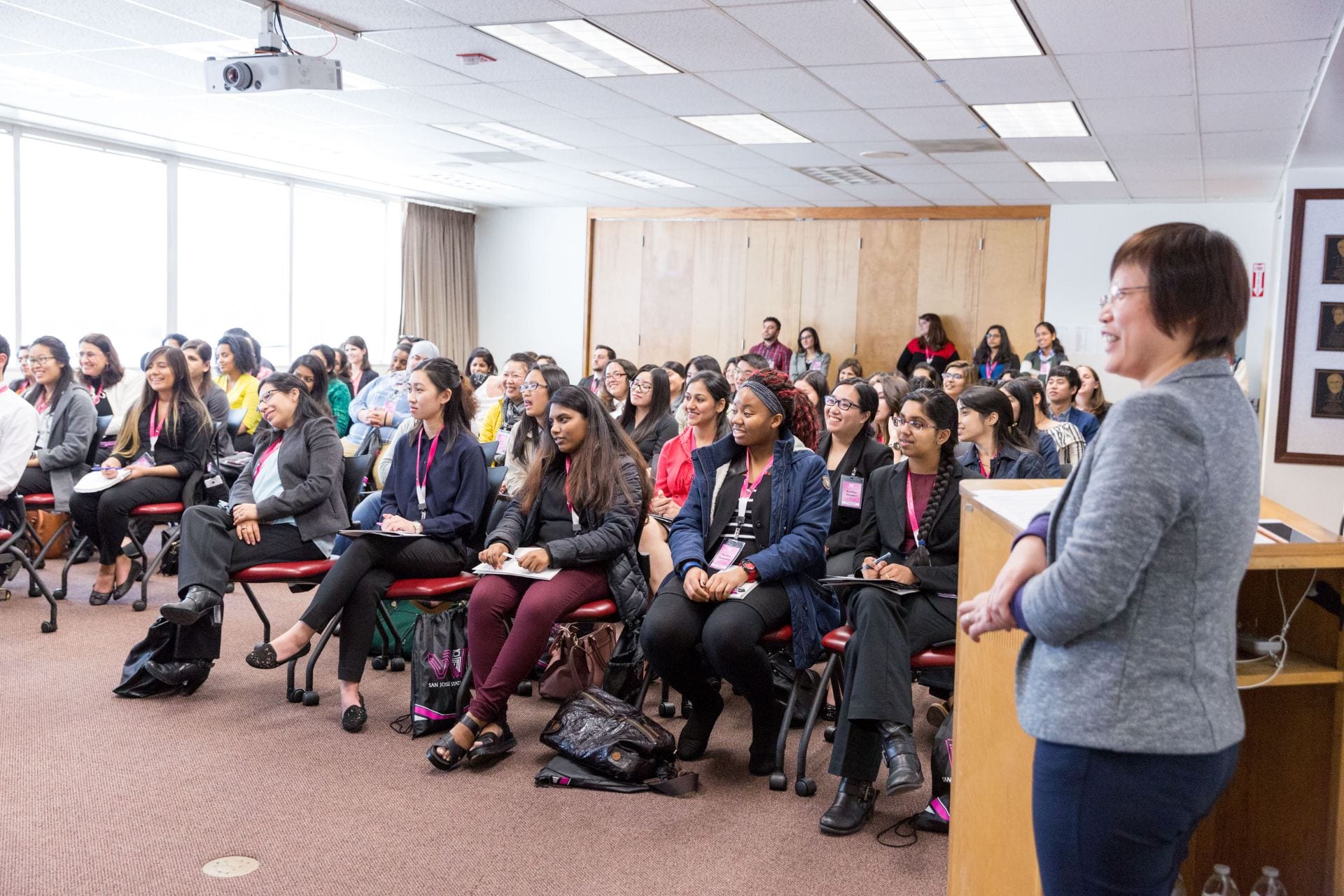 University and community college students listen to women leaders from top technology firms during the Silicon Valley Women in Engineering Conference in 2018. Photo by David Schmitz