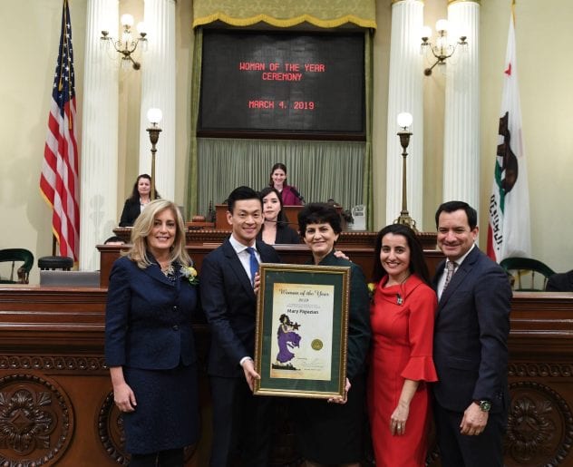 Assemblymember Evan Low, second from the left, presented the Woman of the Year Award for District 28 to SJSU President Mary A. Papazian, center, at the California State Capitol March 4. Photo courtesy of Assembly Low's Office.