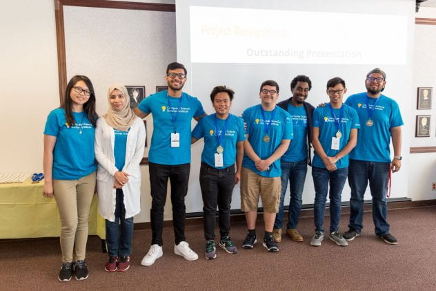 Ray Sawyer, third from the right, poses with students during the final day of Google's CSSI Extension program. Photo by David Schmitz
