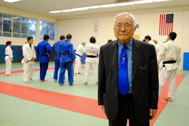 Yoshihiro Uchida stands in the judo dojo in the building named for him at SJSU.  Photo by Christina Olivas