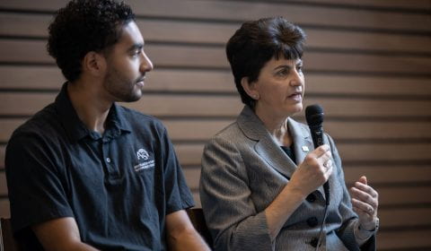 President Papazian and AS President Branden Parent talk to students at a "Pizza with the President" event.