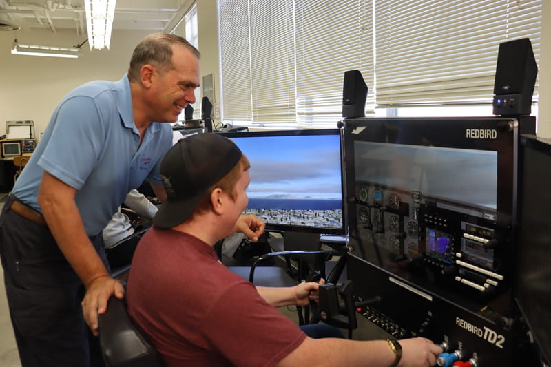 Aviation and technology Lecturer Clayton Conrad and student Cody Coltin Goodwin