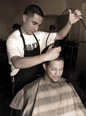 Pedro Garcia cutting hair