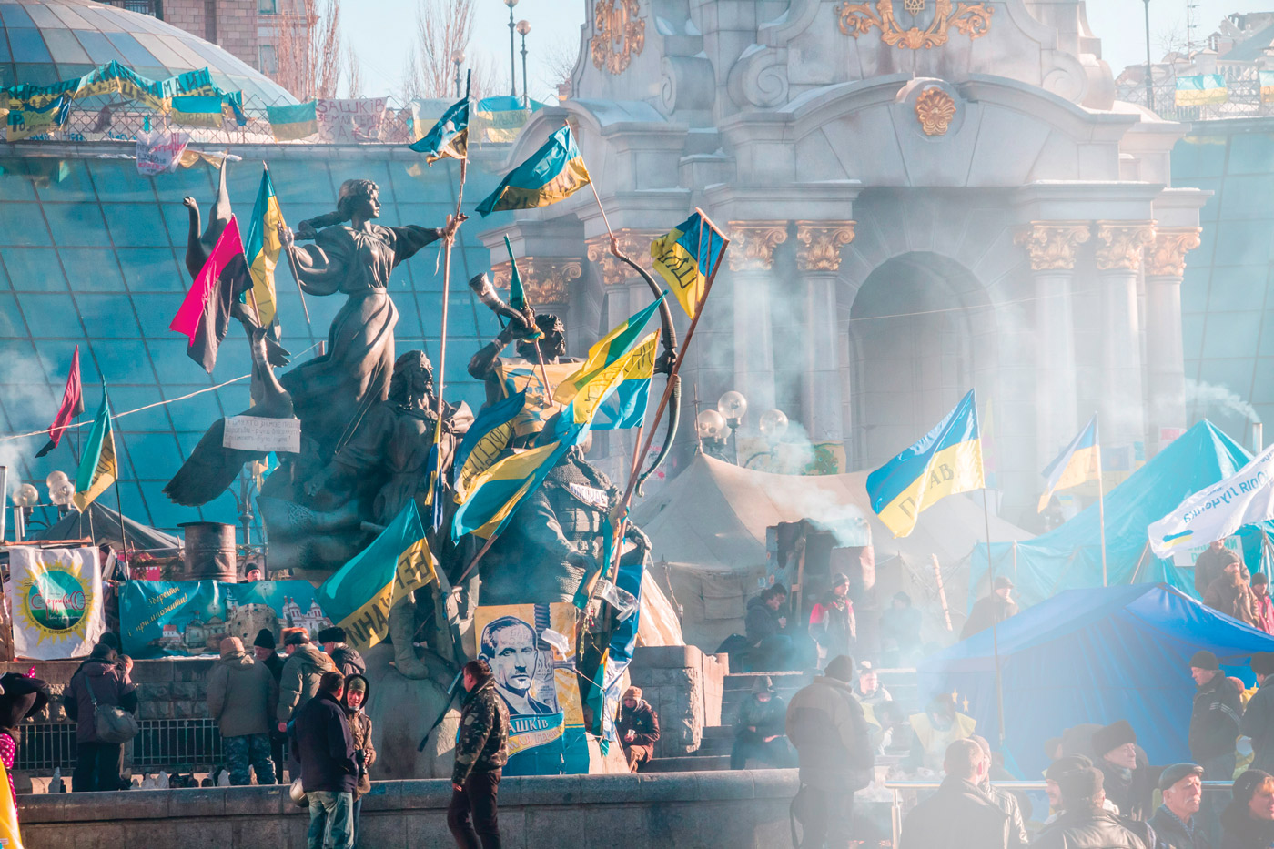 Located in Independence Square, the monument to the founders of Kyiv is covered in protester flags. Photo: Demotix.com.