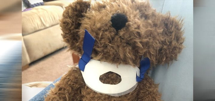 Teddy bear that is used to demonstrate tracheostomy care.